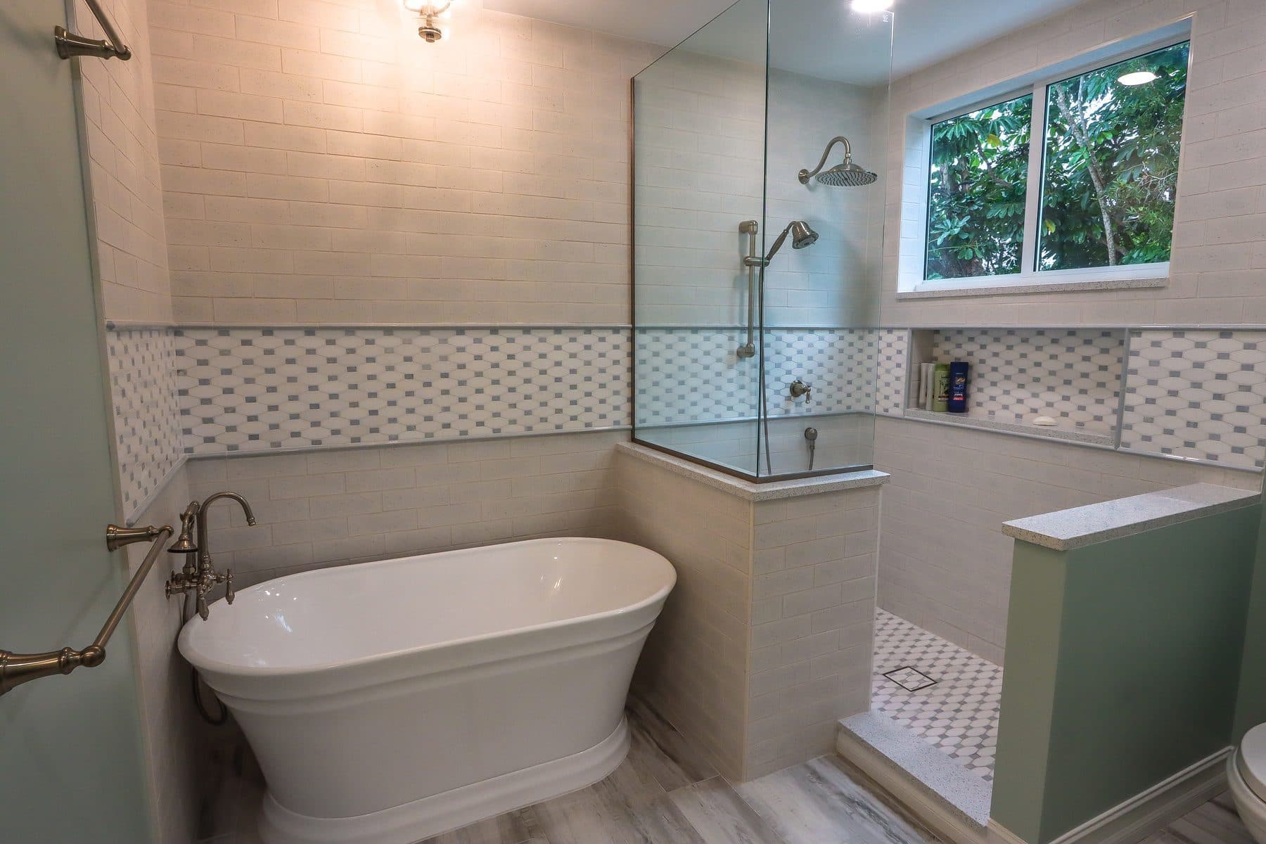 Bathroom with freestanding tub and glass shower
