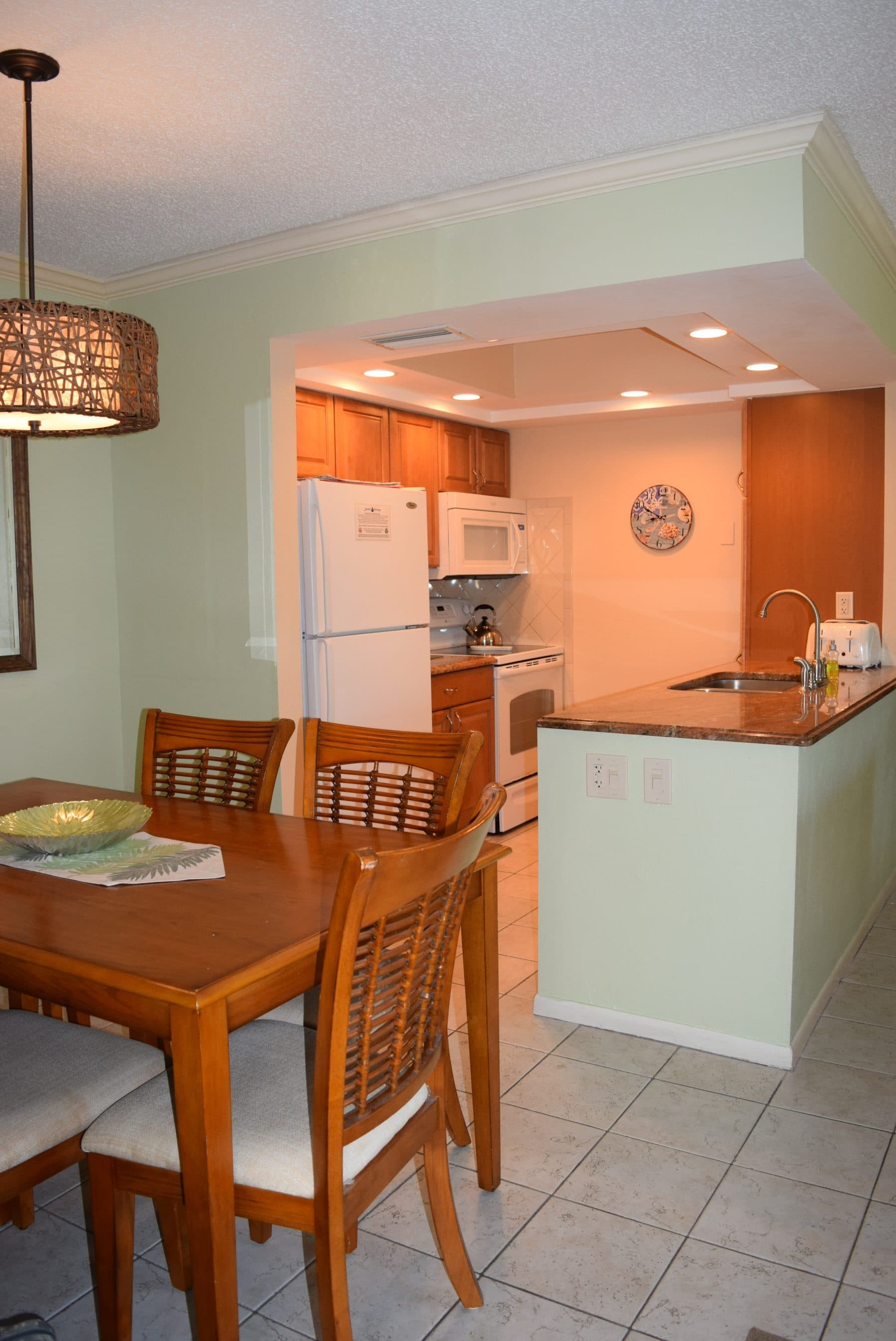 Dated kitchen with orange cabinetry