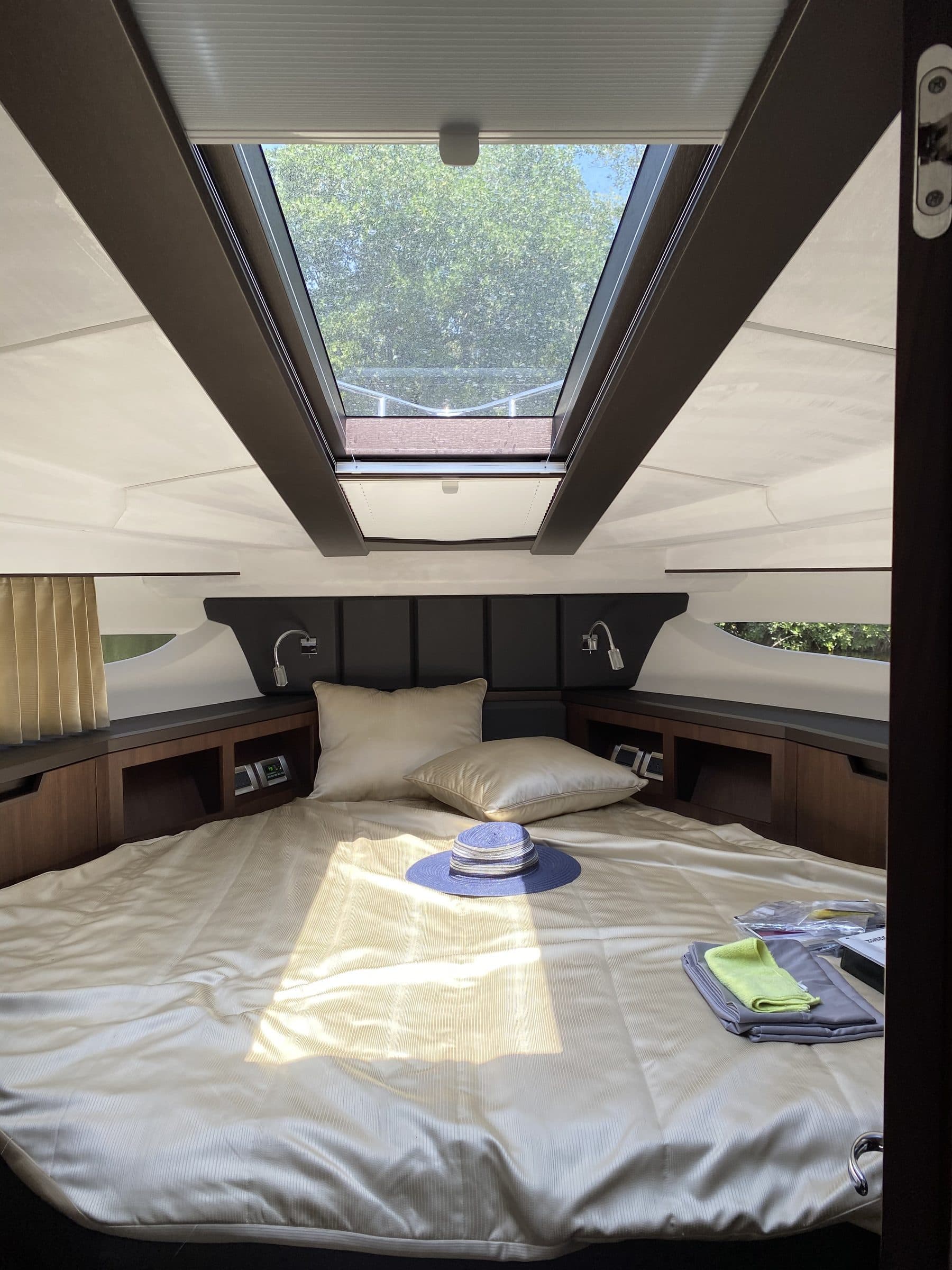 Boat cabin berth beneath a skylight