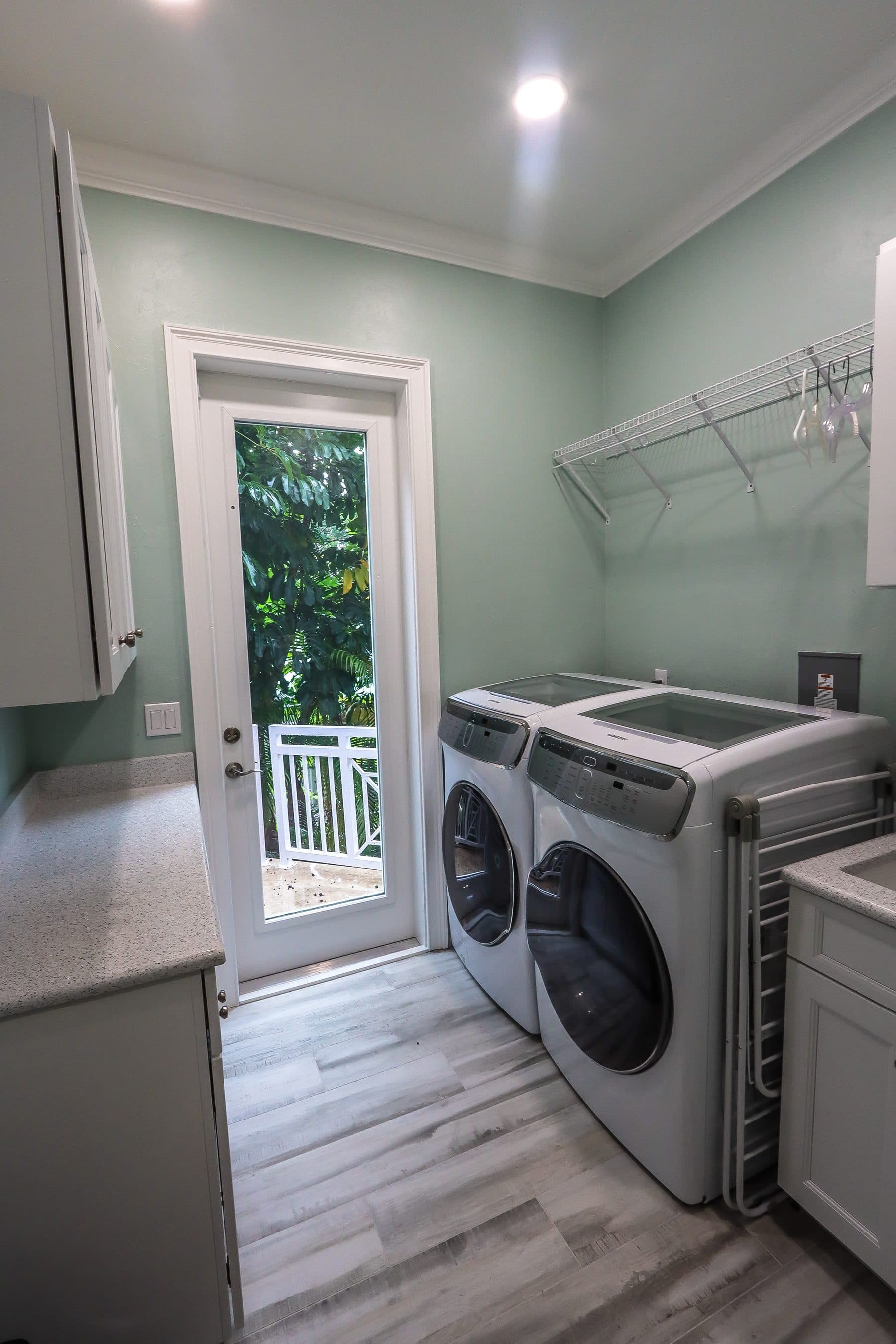 Laundry room with exterior door access