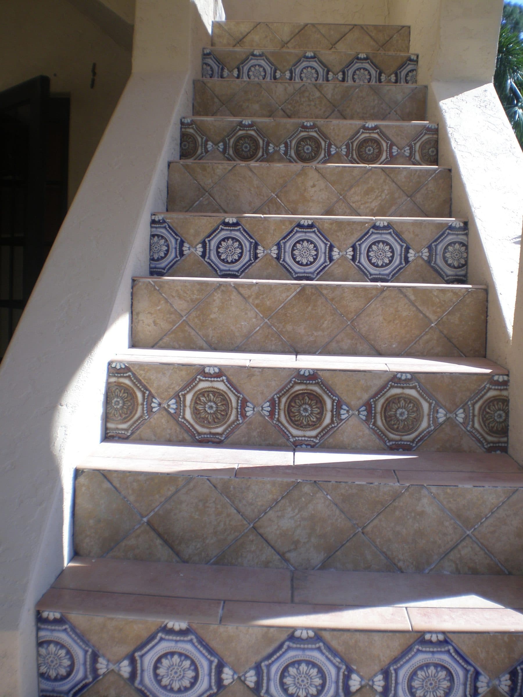 Staircase with Mediterranean tile inlay